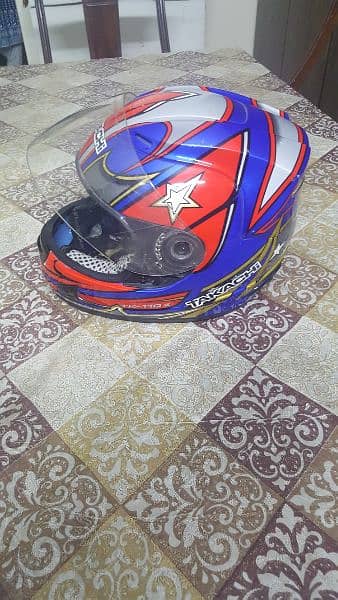 'TAKACHI'Thiland Branded motorcycle helmet. Size, Small. hi 10