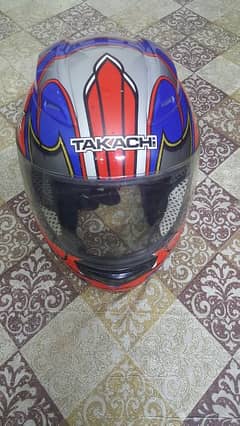 'TAKACHI'Thiland Branded motorcycle helmet. Size, Small. hi