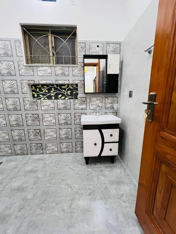 10 MARLA Brand New luxury ULTRA MODERN stylish style Corner house available for sale in wapda town phase 1 lahore . by Fast property services lahore . 33