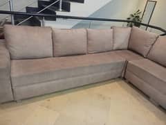 L shaped sofa almost new condition molty poshish