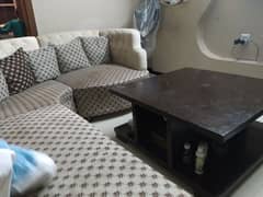 L shaped sofa with table