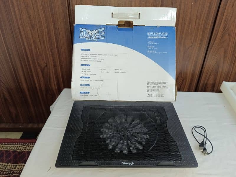 laptop cooling pad and A4 paper cutter 1