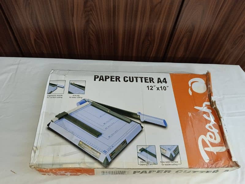 laptop cooling pad and A4 paper cutter 7