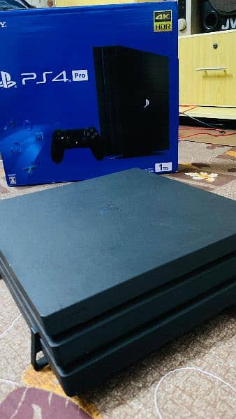 PlayStation 4 Pro 1TB with 7 Games, 2 Controllers & Full Accessories 2