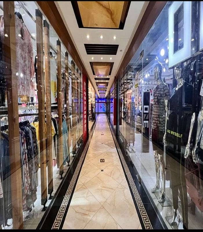 ATTENTION COMMERICAL SHOP IN JASMINE MALL WITH HIGH RENTAL INCOME AVAILABLE FOR SALE IN BAHRIA TOWN LAHORE NEAR TO TALWAR CHOWK 2