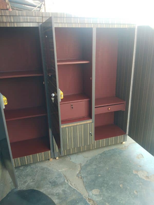 3 door cupboard 1