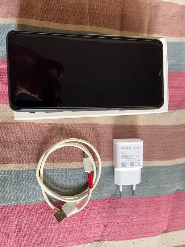 Samsung a20s with original charger and cable 1