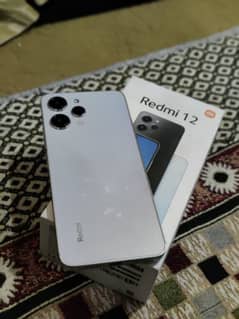 redmi 12 in wrannty with box and charger 03098483503 0