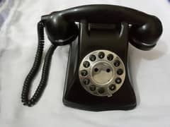 "Vintage Black Rotary Dial Phone"