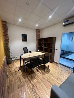 furnished Office for rent in Johar town main road near signal for (Call center + Software house + Marketing office and other setup as you want)