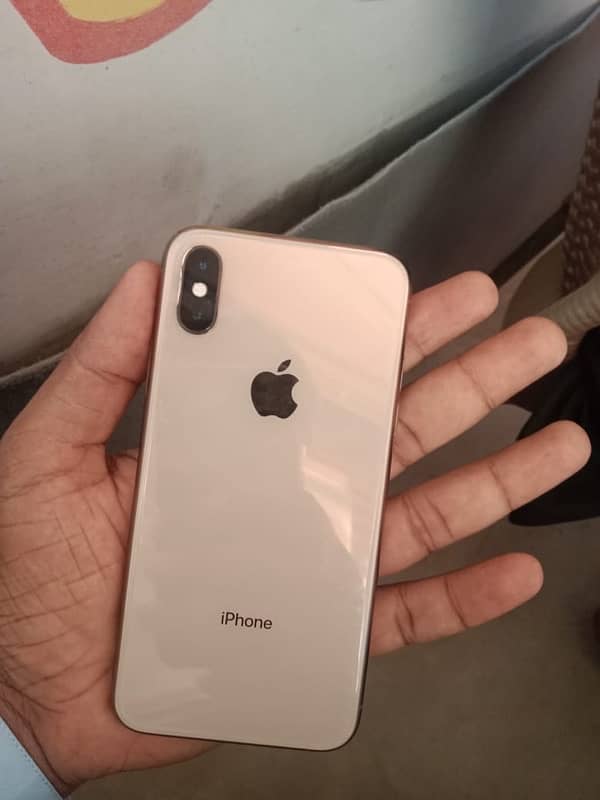 iphone xs gold clore 10 by 10 both sim pta approved 1