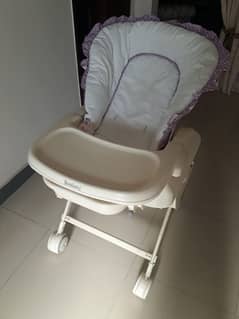 Baby high chair cum rocker