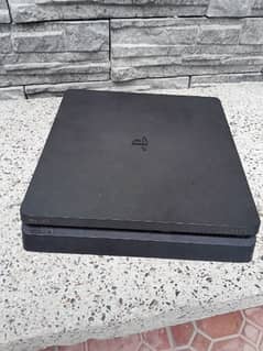 ps 4 SLIM  1 TB WITH TWO CONTROLLERS