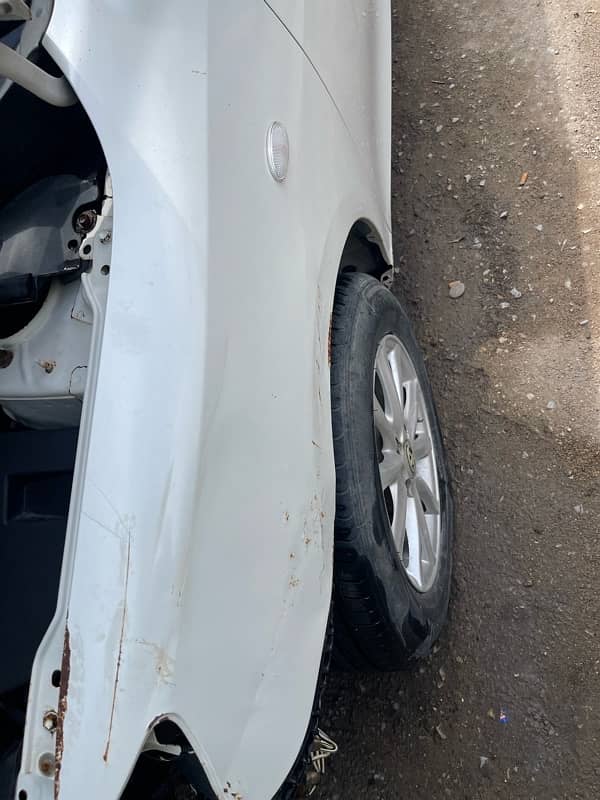 Toyota Axio 2007  Only Body parts in pearl white colour 8