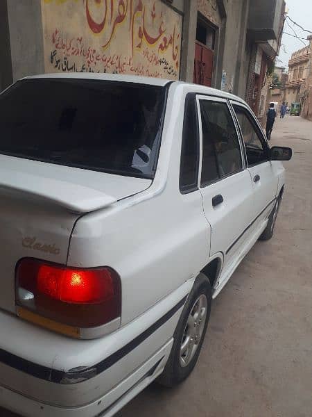 KIA Classic totally genion. . only side door touching 4