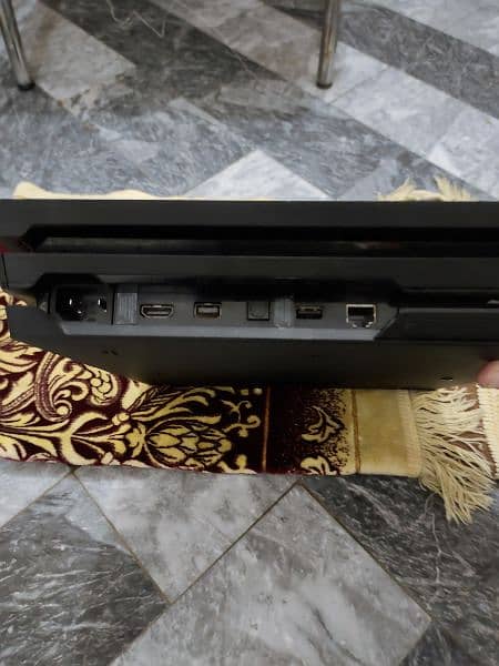 PS4 PRO with 2 games and original controller 1