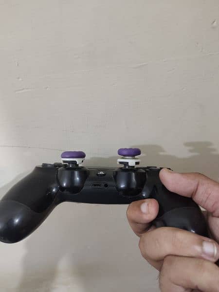 PS4 PRO with 2 games and original controller 3