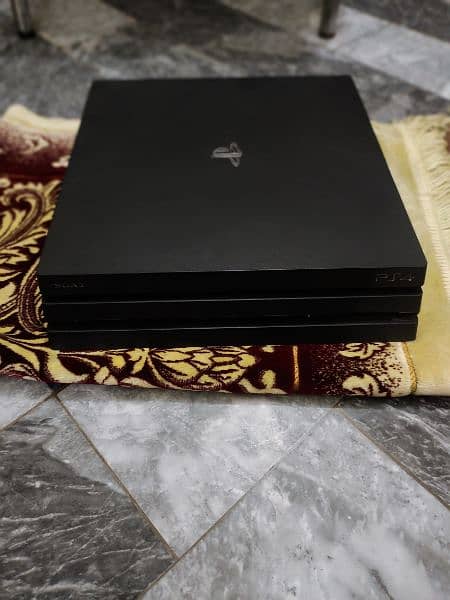 PS4 PRO with 2 games and original controller 5