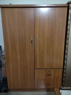 AOA . . . . good condition wooden cupboard final price is Rs: 5000