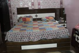 bed set with wardrobe and side table and dressing table