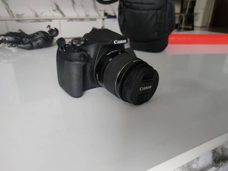 1. "Canon EOS 2000D DSLR Camera - Excellent Condition" 1