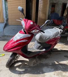 united scooty 100cc