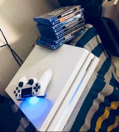 PS4 Pro 1tb White Color included with games