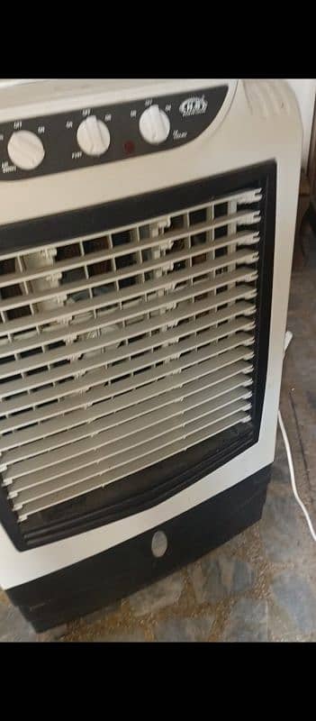 Air Cooler AC/DC  1Month use Hy new condition 10 by 10 4