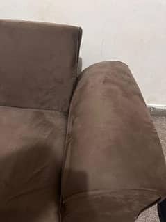 sofa comebed in brown velvet