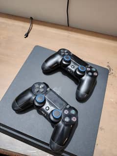 Ps4 slim 1 tb console with 2 controllers