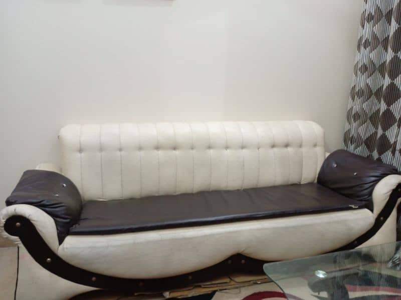 7 seater sofa's + table for sale (used) 1