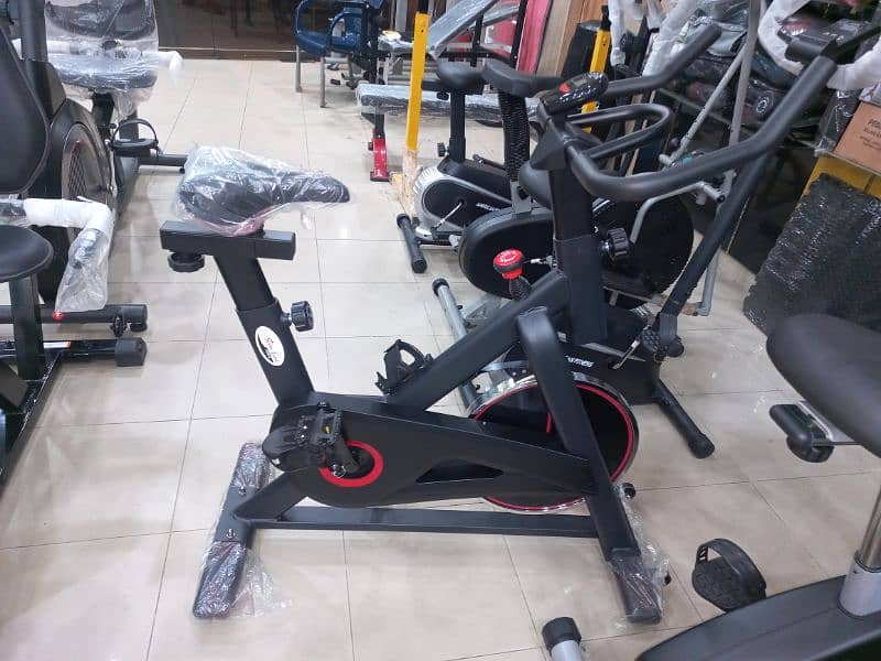 slimline exercise spinning bike cycle gym and fitness machine 1