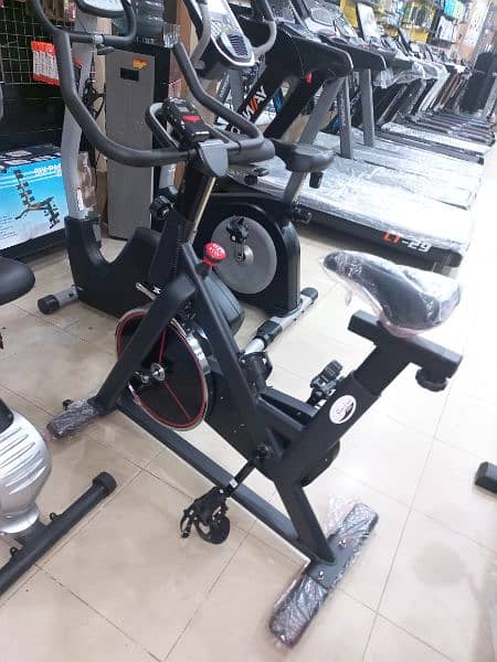 slimline exercise spinning bike cycle gym and fitness machine 3