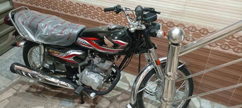 Honda 125 new ha 900km Chala ha bs 1