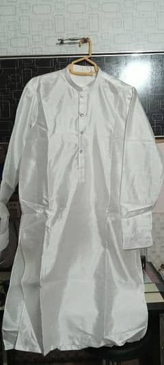 Silk White shalwar kameez Perfect for wedding events.