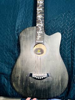 green wood polished guitar