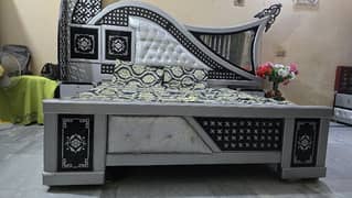 MASTER BED WITH SHOWCASE AND DRESSING