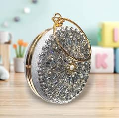 women's metal embellished fancy clutch