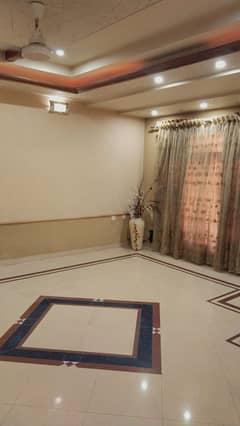 20 Marla Stunning House Available For Rent in Faisal Town, Canal Road Faisalabad