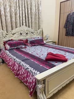 King-size wooden bed with mattress , side tables and dressing table