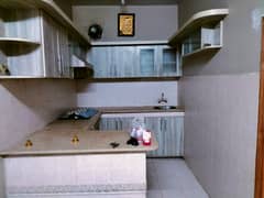 two bed dd portion for rent in johar 0