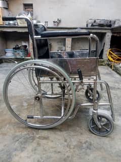 wheel chair good condition only Rs. 8000