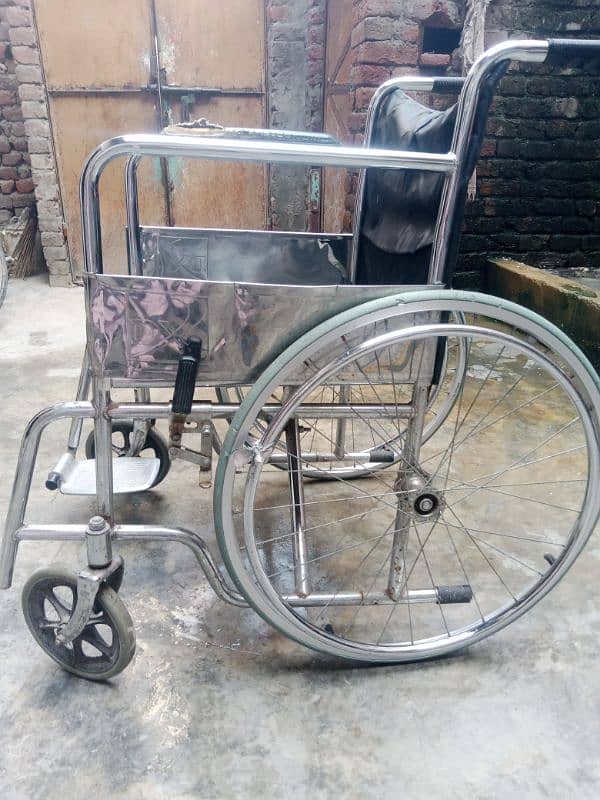 wheel chair good condition only Rs. 8000 1