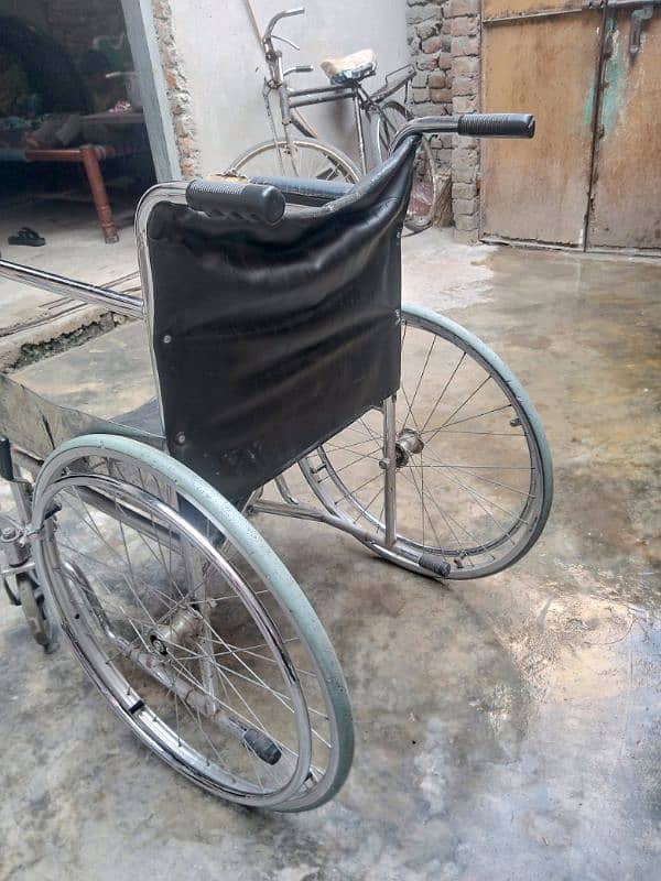 wheel chair good condition only Rs. 8000 2