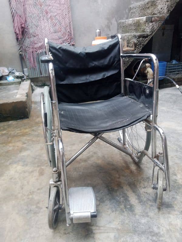 wheel chair good condition only Rs. 8000 4