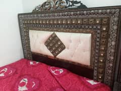 wooden double bed