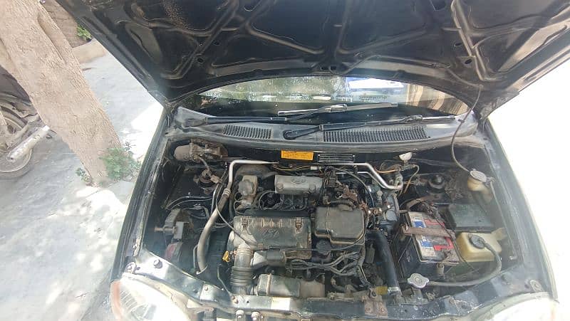 Hyundai Santro almost original paint,LPG average 23-24 with AC 6