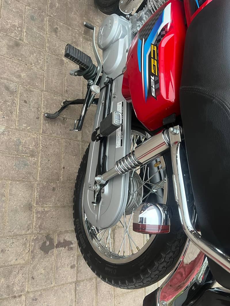 islambad number first owner new bike 0 condition 4