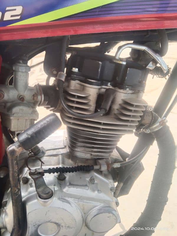 honda 125 Karachi num 1st owner complete paper 4