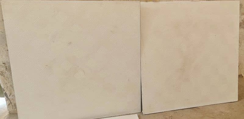 32 Used 2x2 Gypsum ceiling tiles Rs. 65 per sheet 1